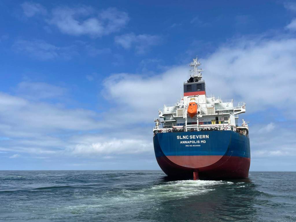 Michael S. Lockett / The Daily World
The SLNC Severn makes way as the pilot boat comes alongside outside of Grays Harbor on July 27.