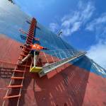 Michael S. Lockett / The Daily World
Harbor pilot Capt. Ryan Leo of the Port of Grays Harbor climbs aboard the SLNC Severn to take the ship in to harbor on July 27.