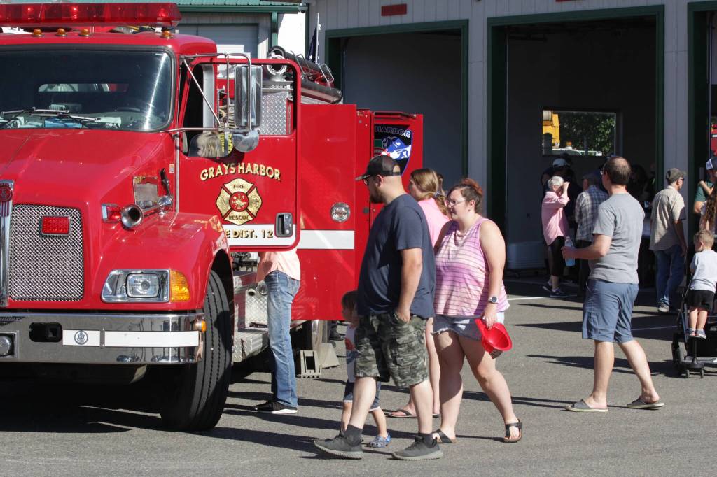 Michael S. Lockett / The Daily World
McCleary residents check out fire department vehicles during the National Night Out event on August 1.