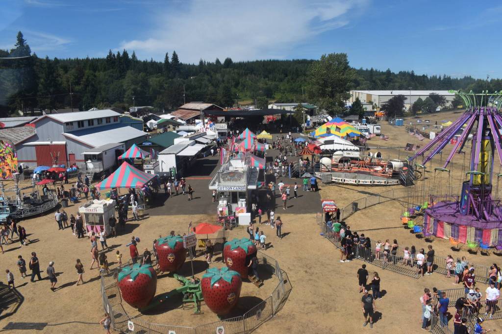 Matthew N. Wells / The Daily World
A view from the ferris wheel on Friday afternoon allowed for a different perspective at the Grays Harbor County Fair, in Elma. While the lines for the rides and the food were long, the spirits were high. People seemed to really enjoy themselves, which is the whole point of the festivities.