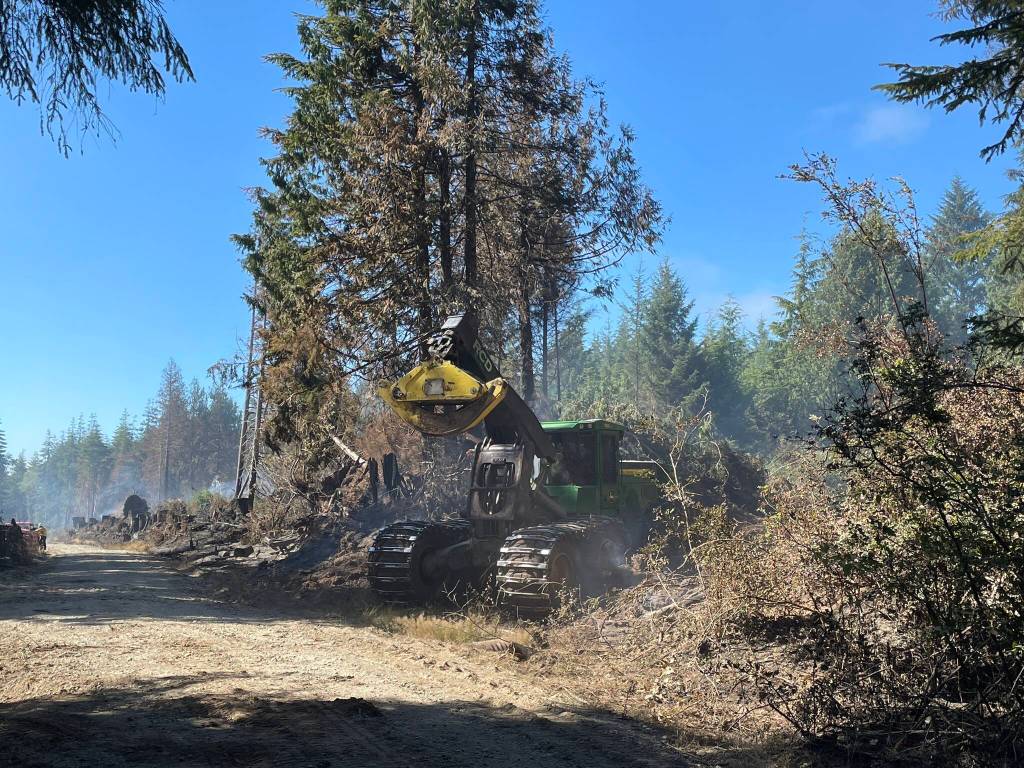 Heavy equipment is used to clear fire lines to slow the Margarita wildire to slow the spread of the blaze. (Michael S. Lockett / The Daily World)