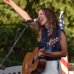 Alex Mabey, who played first on Friday night at the Grays Harbor County Fair in Elma, was quite expressive as strummed and sang her heart out in front of the large crowd. Her set was quite popular as all eyes were on her and the band with whom she played. What a band! Mabey said. Im the lucky one! (Matthew N. Wells / The Daily World)
Matthew N. Wells / The Daily World
Alex Mabey, who played first on Friday night at the Grays Harbor County Fair in Elma, was quite expressive as she strummed and sang her heart out in front of the large crowd. Her set was quite popular as all eyes were on her and the band with whom she played. What a band! Mabey said. Im the lucky one!