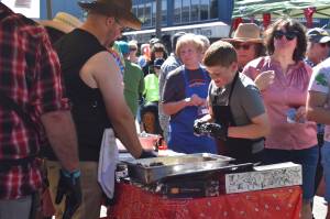 Matthew N. Wells / The Daily World
BS BBQ, starring a trio of Aberdeen High School teachers and one of their sons, won Summerfests Peoples Choice award for best tri-tip beef, won the beans category during the official BBQ competition and placed third in the ribs category. The team  of Jesse Winter and his son, William Rabung and John Kranich  raked in a total of $600 for their efforts.