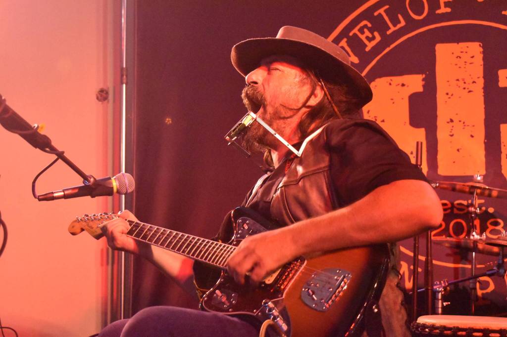 Matthew N. Wells / The Daily World
Jarod Peterson, one of many musicians to play at the Songwriter Showcase and Benefit for Alex Montoya, sings his heart out Saturday night for the memory of his friend Alex Montoya at Messy Jessys Bar and Grill, in Aberdeen. Peterson played guitar, harmonica and drums with his feet in a crowd-pleasing and memorable performance.