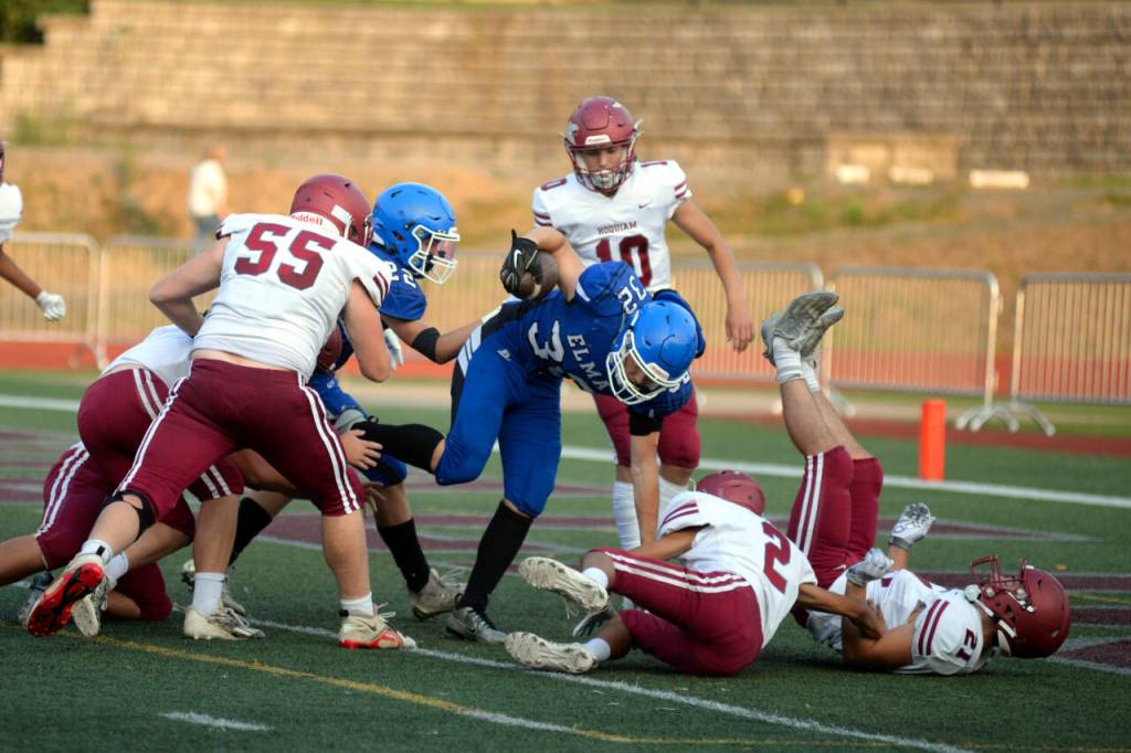 RYAN SPARKS | THE DAILY WORLD Elma running back Isaac Phillips (32) scores a touchdown against Hoquiam during the 15th Annual Montesano Jamboree on Friday at Jack Rottle Field.