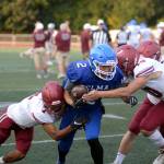 RYAN SPARKS | THE DAILY WORLD Elmas Jackson Schneider (2) is tackled by Hoquiams Aden Bennett-Bryson (7) and Zander Jump during the 15th Annual Montesano Jamboree on Friday at Jack Rottle Field.