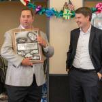 Rich Hartman, left Five Star dealerships owner holds a 25-year anniversary plaque, accompanied by Ford Regional Manager Steven Kettler, during a celebration on Monday, Aug. 28 at the dealership's east Aberdeen location. (Alicia Tisdale / Five Star Dealerships)