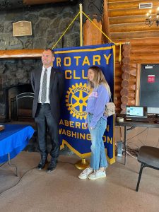 Provided photo
Zoé Roux, an international exchange student through Aberdeen Rotary Club, recently visited Grays Harbor. She lived here during the 2015-16 academic year. Roux  seen at the Rotary Log Pavilion with Josh Steele, right, who oversees the program was not only a student, but she was on the swim team and immersed herself into the culture. Roux called her school year here as the best time of her life.