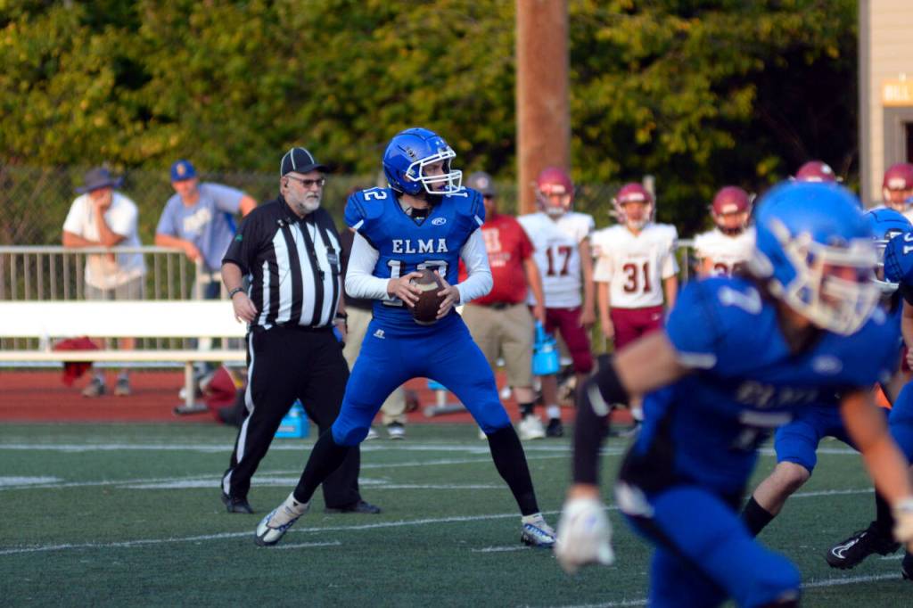DAILY WORLD FILE PHOTO Elma quarterback Carson Studer and his Eagles teammates kick off the 2023 season against Centralia on Friday in Centralia.