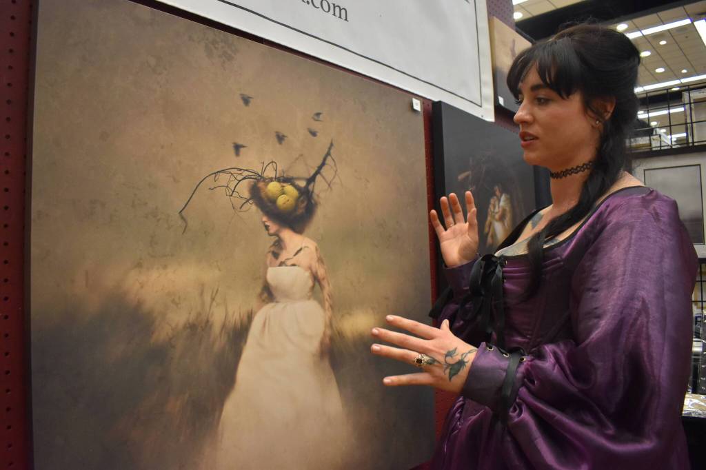 Matthew N. Wells / The Daily World
Jade Black, a self-portrait photographer, explains what goes into her art. This photo shows Black wearing part of a tree and a nest at Damon Point. I got this branch and I put it on my head, Black said. And then in Photoshop I went ahead and took the nest that I photographed and I put it on my head as well to make it look like Im sort of a tree with a nest on my head. Search online for www.jade-black.com to find more of Blacks work.