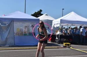 Matthew N. Wells / The Daily World
Mindy Morgan, of Ocean Shores, hulas with her hoop outside the Ocean Shores Convention Center. Morgan, who was demonstrating her skills during the 54th annual Associated Arts Ocean Shores Arts & Crafts Festival, had plenty of hoops for people interested in joining her. Morgan danced with hoop and had a lot of fun doing so. I always love this festival, she said.