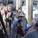 Guests line up to sail aboard the Lady Washington as part of Harbor Days on September 2. (Michael S. Lockett / The Daily World)