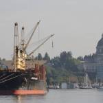 The state capitol building in Olympia stands in the sinking sun as the Lady Washington sails north on September 2. (Michael S. Lockett / The Daily World)
