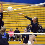 RYAN SPARKS / THE DAILY WORLD Aberdeen middle blocker Lilly Camp, right, records a kill during a straight-set victory over Elma on Wednesday at Aberdeen High School.