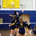 RYAN SPARKS / THE DAILY WORLD Elma middle blocker Callie Galligan (13) makes a play on the ball during a 3-0 loss to Aberdeen on Wednesday at Sam Benn Gym in Aberdeen.