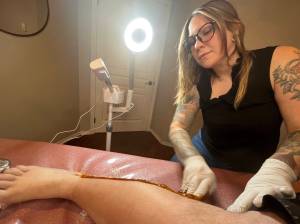 Matthew N. Wells / The Daily World
Amanda Melay, who is a master esthetician and expert sugarist, owns Orb & Crescent Sugaring Spa  114 E. Chance a La Mer NE, in Ocean Shores. Melay worked on a client Wednesday afternoon. The expectation was reliving a comedy bit from The 40-Year-Old Virgin. Instead, it was nearly painless.