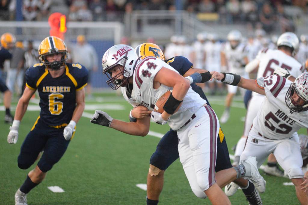 RYAN SPARKS | THE DAILY WORLD Montesano senior running back Gabe Bodwell (44) carries the football during the first half of a 38-7 victory over Aberdeen on Friday in Aberdeen.