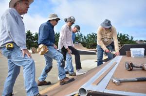 Clayton Franke / The Daily World
From left: Jim Golden, Bob Rhoades, Sylvia Schroll, Ed Schroll and Richard Wills work to construct new ramps at the Ocean Shores Skatepark on Friday, Sept. 7.