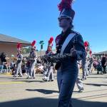 Hoquiam High School Marching Band, seen here turning from 8th Street onto K Street during Hoquiam Loggers Playday on Saturday, gave a rousing performance as they marched proudly under the warm sunny skies in downtown Hoquiam. Later in the night they marched onto the field at Olympic Stadium and gave a performance their school's athletic director, Shane Krohn, said was "outstanding." (Matthew N. Wells / The Daily World)