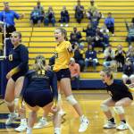 RYAN SPARKS / THE DAILY WORLD
Aberdeens Alviyah Lamont (13), Annika Hollingsworth (11), Sophie Knutson (20) and Claire Mottinger celebrate a victory in the third game of a 3-2 win over Myrtle Street rival Hoquiam on Tuesday at Sam Benn Gym in Aberdeen.