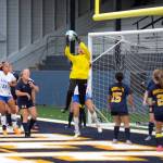 RYAN SPARKS | THE DAILY WORLD Aberdeen goal keeper Jaylynn Phimmasone leaps to deflect a corner kick during the first half of a 1-0 loss to Elma on Tuesday in Aberdeen.