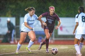 PHOTO BY FOREST WORGUM Montesano senior Mikayla Stanfield (15) moves the ball upfield during the Bulldogs 6-1 win over Evergreen (Vancouver) on Tuesday at Jack Rottle Field in Montesano.