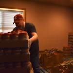 Clayton Franke / The Daily World
Volunteer Oscar Bramstedt stockpiles peanut butter at the Aberdeen Food Bank on Sept. 19. Peanut butter is one of the items the food bank has resorted to purchasing directly despite its high cost.