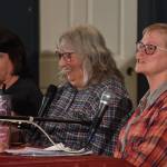 Ocean Shores City Council candidates Caroline Emmert, left, and Alison Cline, right, sit with moderator Gina Rawlings, center, during a forum hosted by Voice of the Shores on Wednesday, Sept. 20 at the Ocean Shores Lions Club. (Clayton Franke / The Daily World)