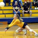 RYAN SPARKS | THE DAILY WORLD Aberdeen Libero Sophie Knutson dives to make a serve reception during the Bobcats straight-set victory over Rochester on Thursday in Aberdeen.