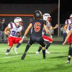 JARED WENZELBURGER | THE CHRONICLE Pe Ell-Willapa Valleys Blake Howard (32) runs with the football during 60-14 loss to Napavine on Friday in Napavine.