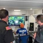 Michael S. Lockett / The Daily World
Members of the King County 4x4 Search and Rescue team and the Grays Harbor Sheriffs Office monitor the drone feed during an evidence search in the Oakley Carlson case.