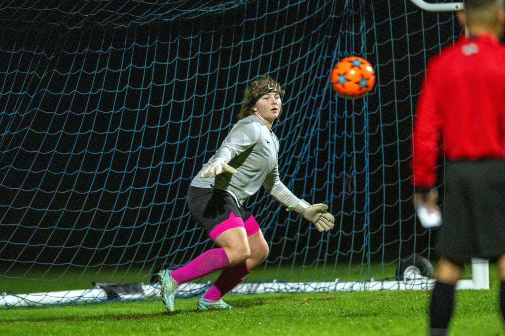 PHOTO BY FOREST WORGUM Elma goal keeper Emmie Spencer keeps an eye on the ball during a penalty-kick shootout loss to Montesano on Tuesday at Davis Field in Elma.
