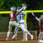PHOTO BY FOREST WORGUM Montesano defensive back Tucker Eaton (8) breaks up a pass intended for Eatonvilles Jacob Simons (19) during the Bulldogs 36-0 victory on Friday in Montesano. Bulldogs defender Toren Crites (12) would intercept the ball on the play.