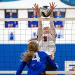 PHOTO BY FOREST WORGUM Hoquiams Hayden Brook-Andrew (5) attempts to block a shot from Elmas Meara Baxter (4) during the Grizzlies 3-2 victory on Thursday at Elma High School.