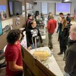 MIchael S. Lockett / The Daily World
Specialists talk to members of the crowd at the Marine Resource Committee summit at the Westport Maritime Museum on Oct. 13.