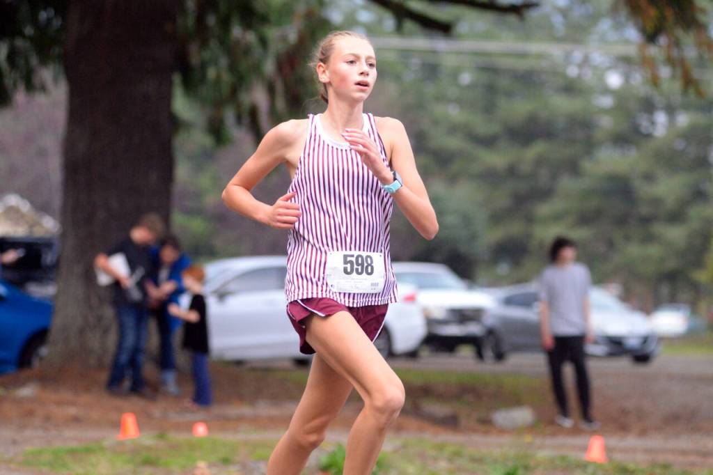 RYAN SPARKS | THE DAILY WORLD Montesano freshman Haley Schweppe placed second in the girls race to lead the Bulldogs to a team title at the 1A Evergreen Championship cross-country meet Thursday at the Oaksridge Golf Course in Elma.