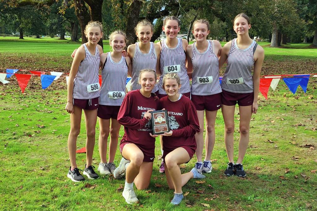 RYAN SPARKS | THE DAILY WORLD The Montesano Bulldogs girls cross country team won the league title at the 1A Evergreen Championship cross-country meet Thursday at the Oaksridge Golf Course in Elma.