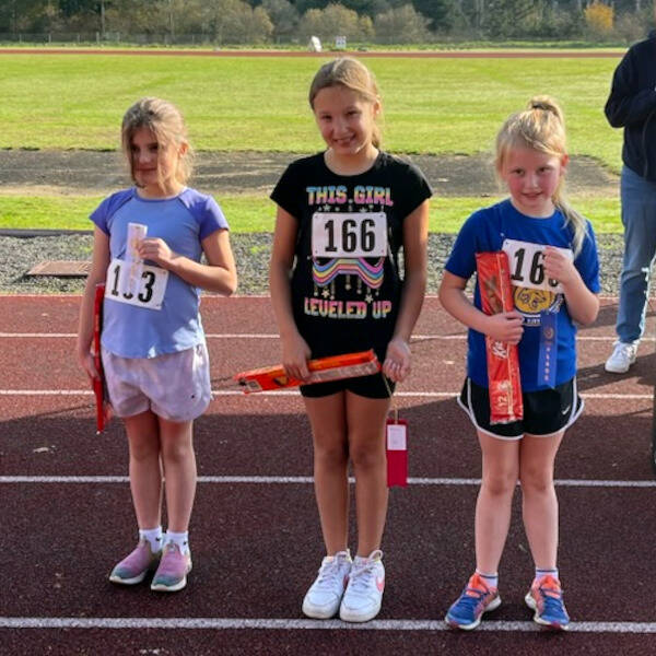 SUBMITTED PHOTO Brown Fynlee, right, Aryana Riojas (166) and Nora Broadhead (163) were the top placing girls runners at the Aberdeen Cross Country Candy Crush Rush race on Sunday at Miller Junior High School in Aberdeen.