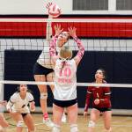 JOSH KIRSHENBAUM | THE CHRONICLE Hoquiam senior middle blocker Kristina Goulet spikes the ball during a 3-1 win over Tenino on Tuesday at Tenino High School.