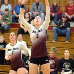 RYAN SPARKS | THE DAILY WORLD Montesanos Karissa Otterstetter (5) put up one of her game-high 36 assists during a 3-1 win over Hoquiam on Thursday at Hoquiam Square Garden. Teammate Grace Gooding (7) looks on.