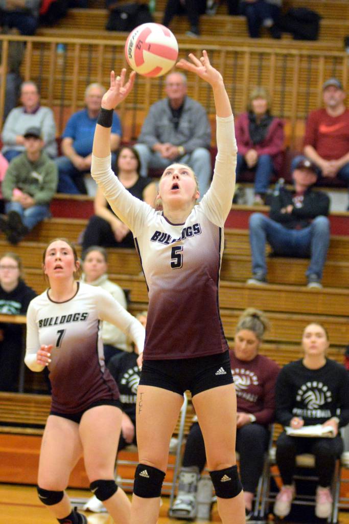RYAN SPARKS | THE DAILY WORLD Montesanos Karissa Otterstetter (5) put up one of her game-high 36 assists during a 3-1 win over Hoquiam on Thursday at Hoquiam Square Garden. Teammate Grace Gooding (7) looks on.