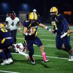 RYAN SPARKS | THE DAILY WORLD Aberdeen senior Marcus Hale (2) breaks a tackle during a run in the Bobcats 26-19 win over Shelton on Friday in Aberdeen.