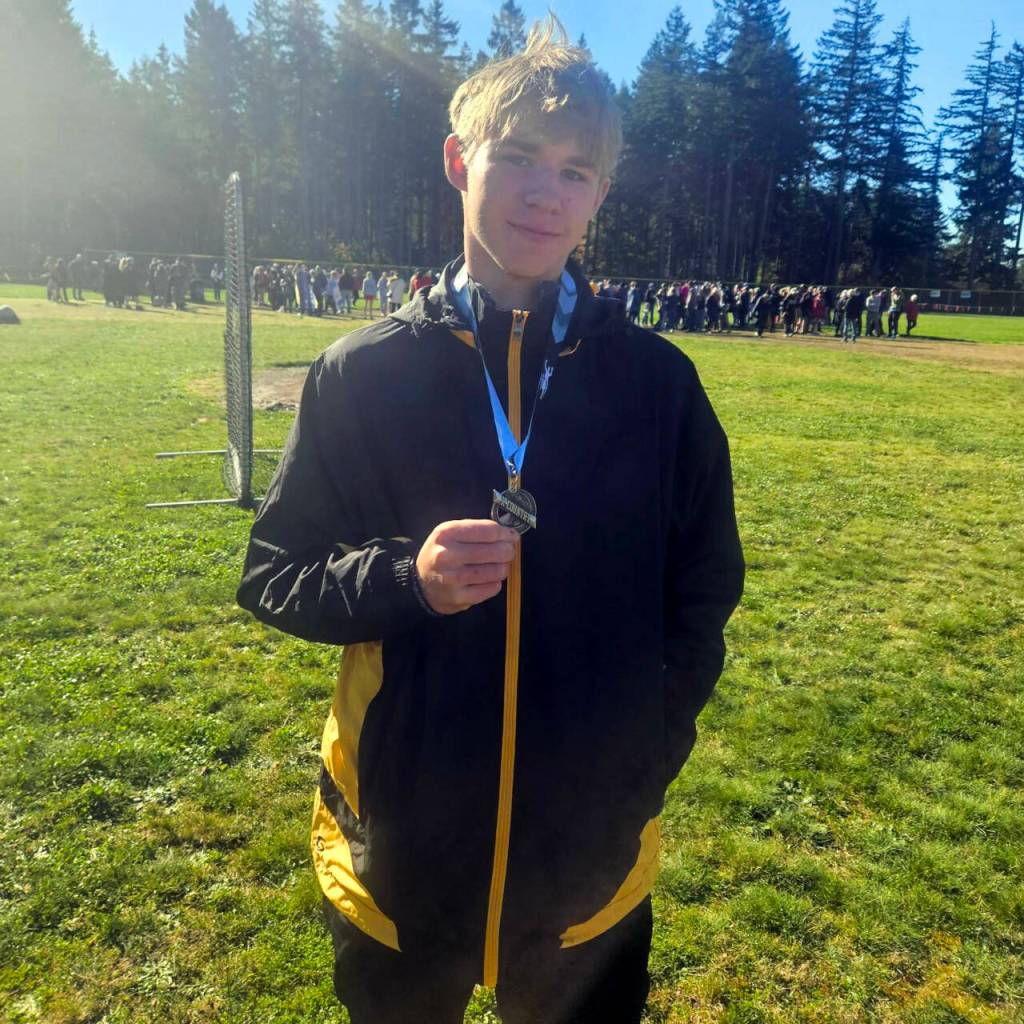SUBMITTED PHOTO North Beachs Atticus Pullius placed 10th in the 1B/2B District 4 boys cross country championship race on Saturday at Rainier Elementary School to qualify for the state meet.