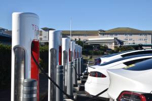 Clayton Franke / The Daily World
Tesla cars charge at the new Ocean Shores Supercharging station in Ocean Shores on Saturday, Oct. 28.