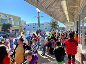 Matthew N. Wells / The Daily World
Ghouls, goblins, Disney characters and other costumed characters lined both north and south sides of downtown Aberdeens Wishkah Street for Aberdeens Spooktacular event. They were all on the hunt for free candy, pop and popcorn from the area businesses and from the Downtown Aberdeen Association, who sponsored the event.