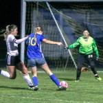 DYLAN WILHELM | THE CHRONICLE Raymond-South Bend goalie Dakota Bale (2) prepares to make a save against Adnas Reagan Naillon (10) during the Ravens 2-1 loss in the first round of the 2B District 4 Tournament on Monday in Adna.