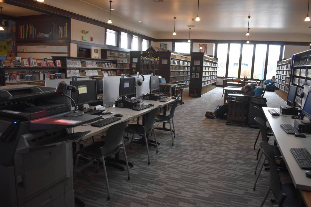 A look at the computer area for the Hoquiam Timberland Library. There, people can surf the internet, print, scan and fax documents. Users get 440 copies of black-and-white pages and 88 color pages per month, which can make it easier on students finalizing a school report, or a business owner drafting up a proposal. (Matthew N. Wells / The Daily World)