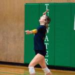 JOSH KIRSEHNBAUM | THE CHRONICLE Aberdeen senior Claire Mottinger serves during the second set of Aberdeen 3-0 loss to Ridgefield in the first round of the 2A District 4 Tournament on Thursday in Tumwater.
