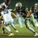 PHOTO BY FOREST WORGUM 
Montesanos Gabe Bodwell (44) sacks Stevenson quarterback Kacen Bach (15) during a 71-0 win in a 1A crossover game on Friday in Montesano.