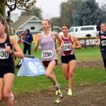 SUBMITTED PHOTO Montesanos Haley Schweppe (1298) and Hoquiams Jane Roloff (1243) stay with the lead pack during the first mile of the 1A State Championship girls cross country meet on Saturday in Pasco. Roloff would go on to win the state championship with Schweppe placing fifth overall.